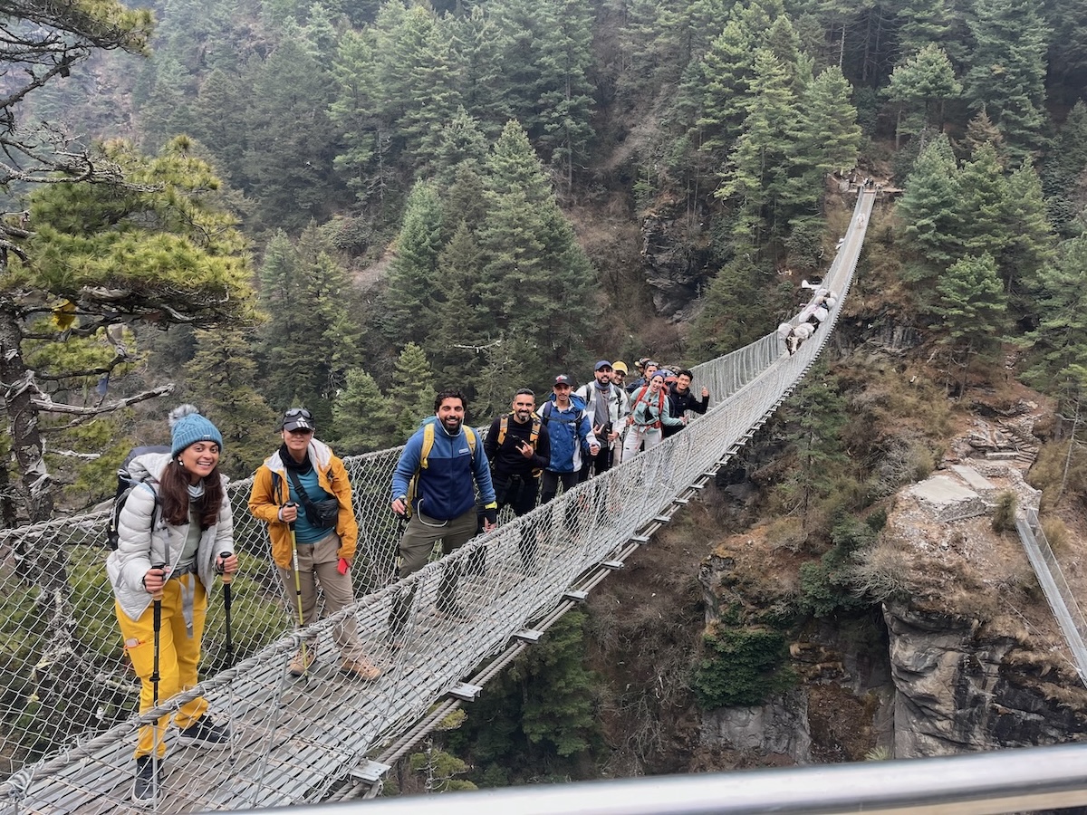 Trekkers corssing Hillary Suspension bridge before Namche
