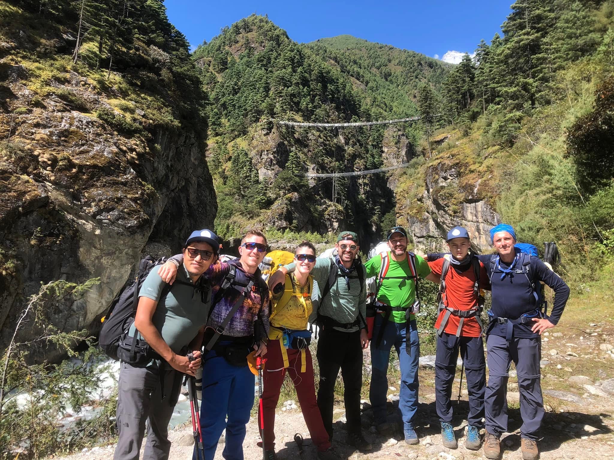 Trekkers with Hillary Suspension Bridge background